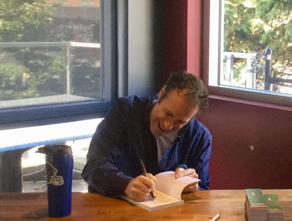 Mental Health Advocate Chris Nihmey Signs Books at the 2018 Launch of Reflections